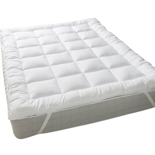 2-inch bamboo and cotton mattress topper on a bed
